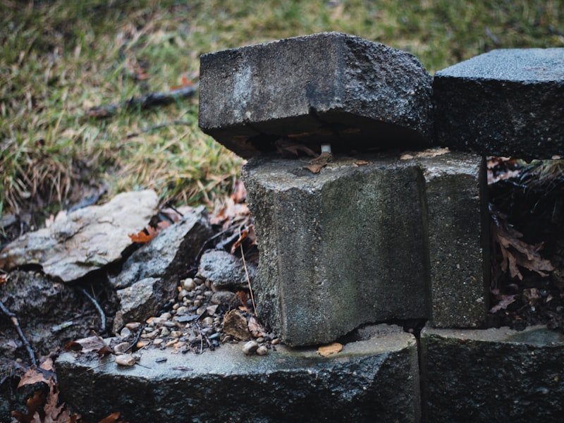 Large natural accent boulders placed on a grassy yard